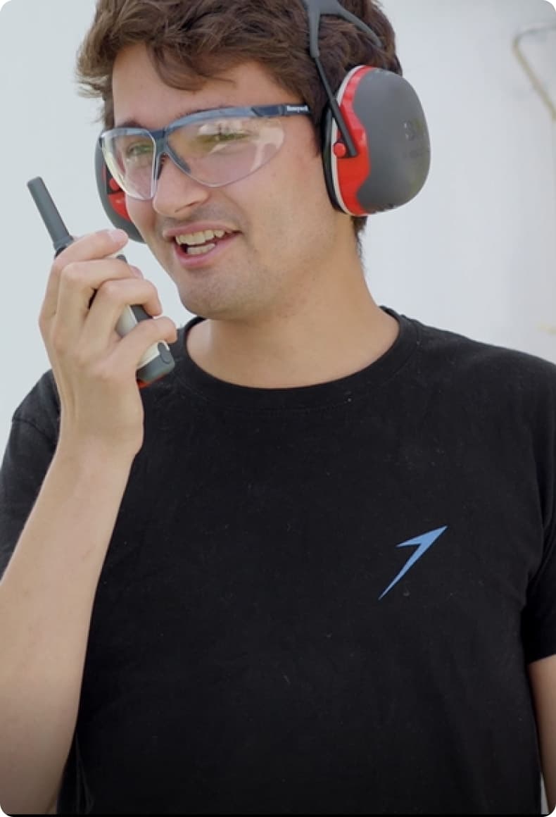 Engineer communicating on radio